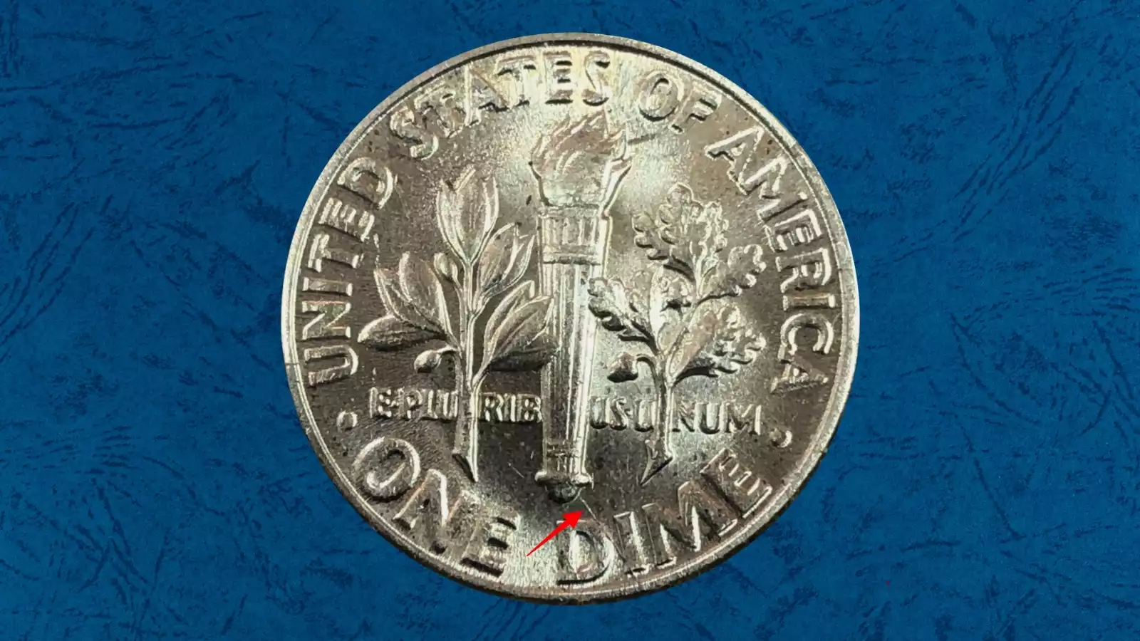 1951 dime die break error showing raised line or cud on the coin surface from a cracked die