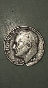 1951 dime misaligned die error showing rotated reverse design compared to normal alignment